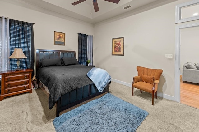 bedroom with ceiling fan and carpet floors