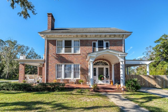 view of front facade with a front yard