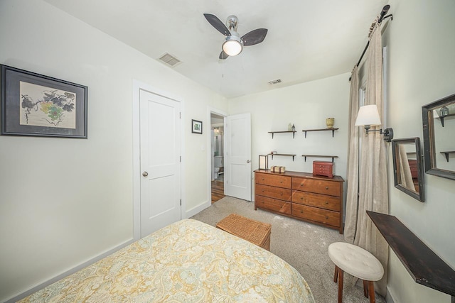 bedroom with baseboards, visible vents, a ceiling fan, and carpet