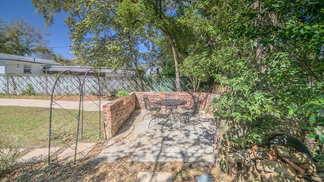 view of patio with fence