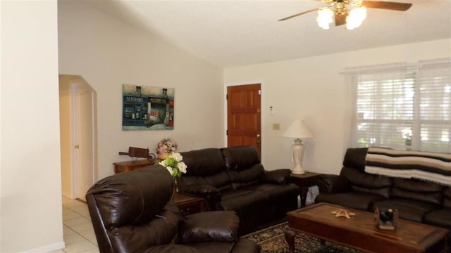 living room with vaulted ceiling, light tile patterned flooring, and ceiling fan