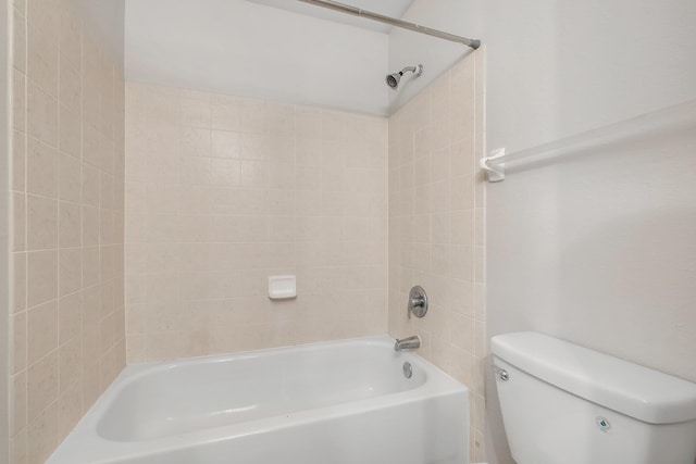 bathroom with toilet and shower / tub combination