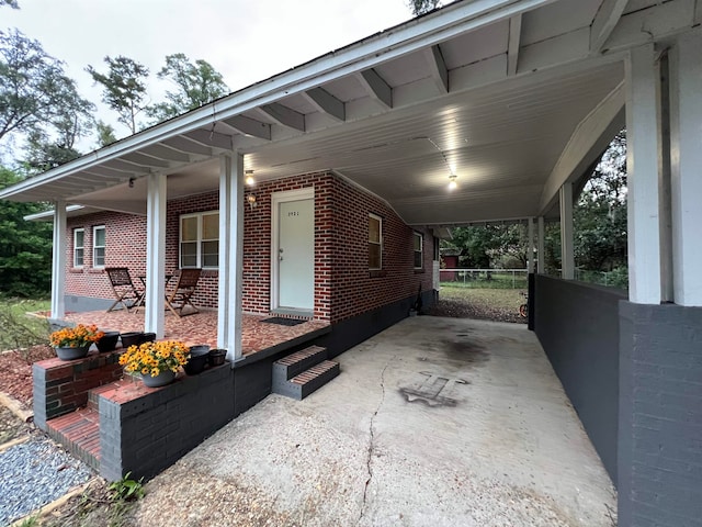 exterior space with a carport