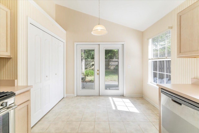 2942 Tewkesbury Trce, Tallahassee, FL 32309 - entryway with wallpapered walls, light tile patterned floors, lofted ceiling, french doors, and baseboards