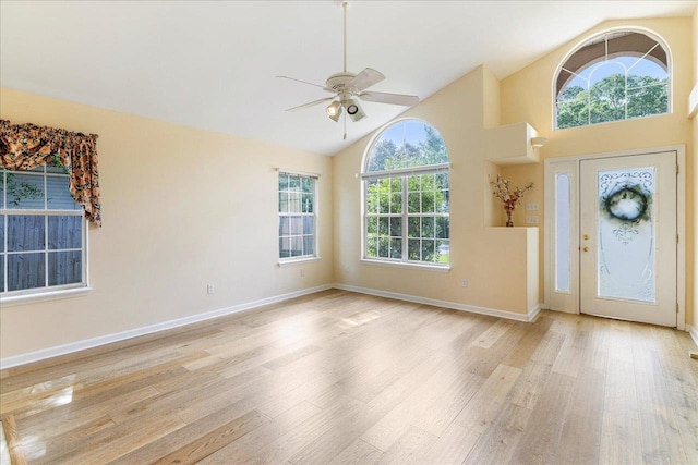 2942 Tewkesbury Trce, Tallahassee, FL 32309 - foyer with wood finished floors, ceiling fan, baseboards, and high vaulted ceiling