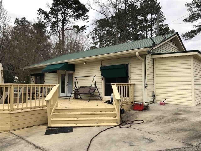 exterior space featuring a patio and a deck