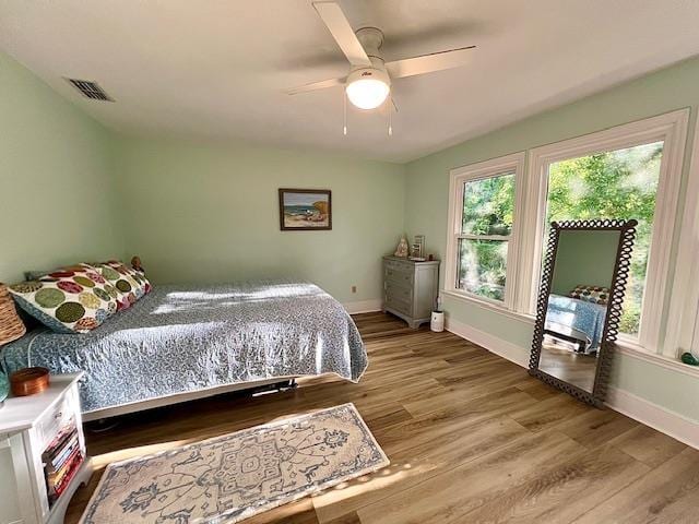 1814 Atlantis Pl, Tallahassee, FL 32303 - bedroom featuring wood finished floors, baseboards, and ceiling fan