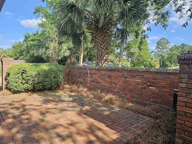 exterior space featuring a patio and fence