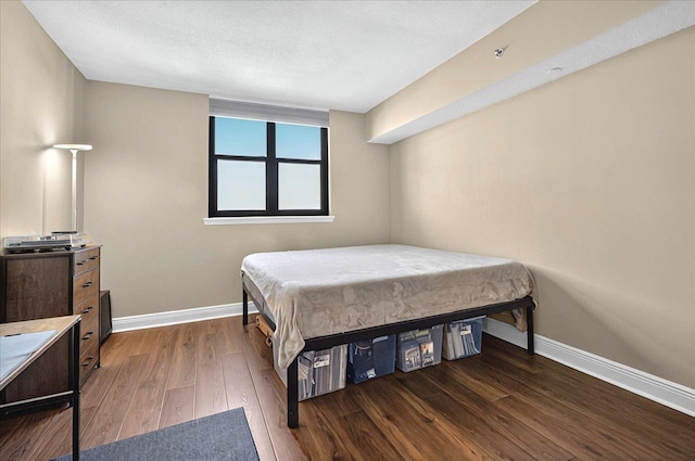 300 S Duval St Unit 1402, Tallahassee, FL 32301 - bedroom featuring wood finished floors and baseboards