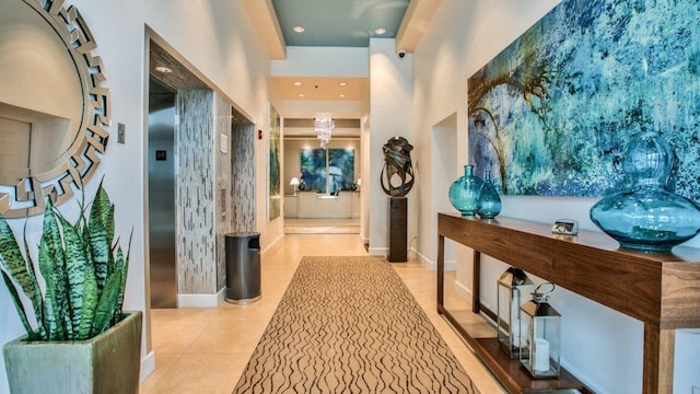 300 S Duval St Unit 1402, Tallahassee, FL 32301 - hall featuring elevator, tile patterned flooring, and baseboards