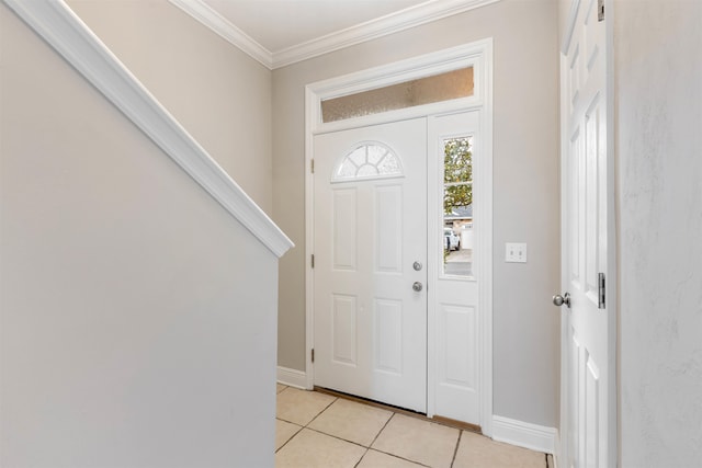 tiled foyer with crown molding