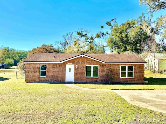 ranch-style house with a front yard