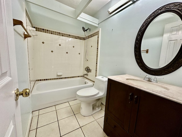 full bathroom with tile patterned flooring, vanity, toilet, and tiled shower / bath