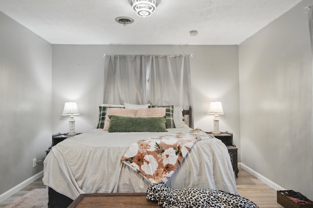 319 Glenridge Rd, Perry, FL 32348 - bedroom with baseboards and wood finished floors