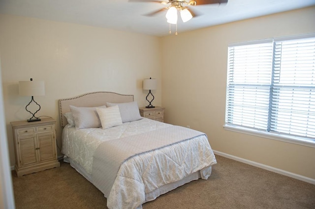 bedroom with light colored carpet and ceiling fan