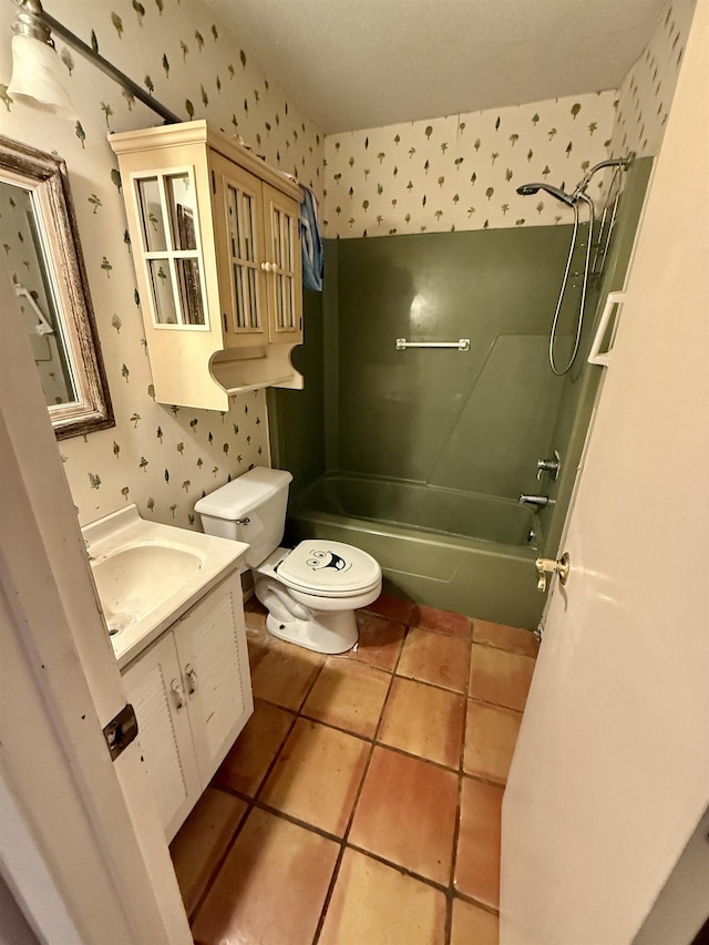 full bath featuring tile patterned flooring, shower / tub combination, toilet, and wallpapered walls