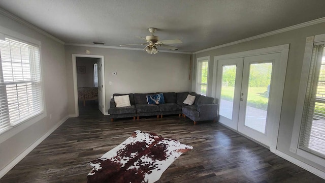 living room with ornamental molding and dark wood-style flooring