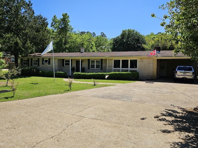 819 Abbiegail Dr, Tallahassee, FL 32303 - ranch-style house with driveway, a chimney, and a front yard