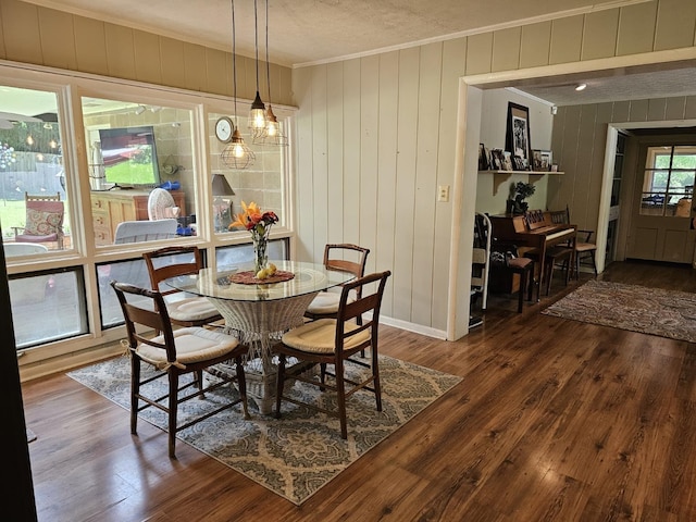 819 Abbiegail Dr, Tallahassee, FL 32303 - dining room featuring ornamental molding, wood finished floors, and wood walls