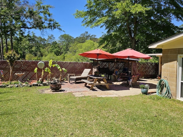 819 Abbiegail Dr, Tallahassee, FL 32303 - view of yard featuring an outdoor fire pit and a patio