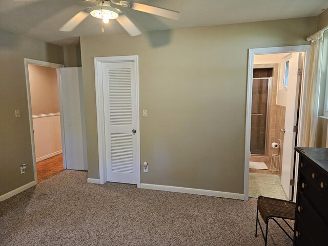 819 Abbiegail Dr, Tallahassee, FL 32303 - unfurnished bedroom featuring carpet flooring, baseboards, ceiling fan, and ensuite bath
