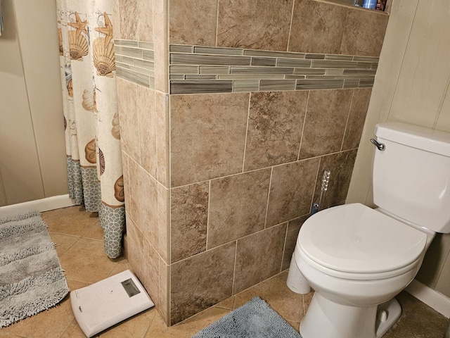 819 Abbiegail Dr, Tallahassee, FL 32303 - bathroom with toilet, tile patterned floors, and baseboards
