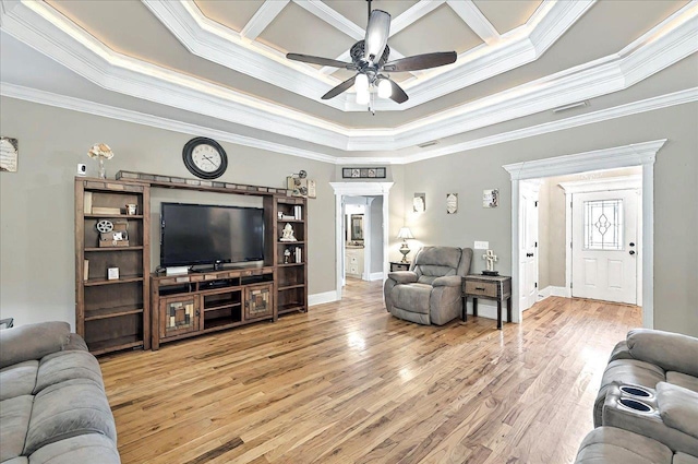 living area with light wood-style flooring, ornamental molding, ceiling fan, baseboards, and visible vents