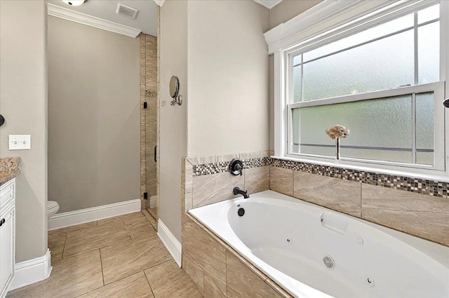 bathroom with vanity, crown molding, a stall shower, visible vents, and a jetted tub