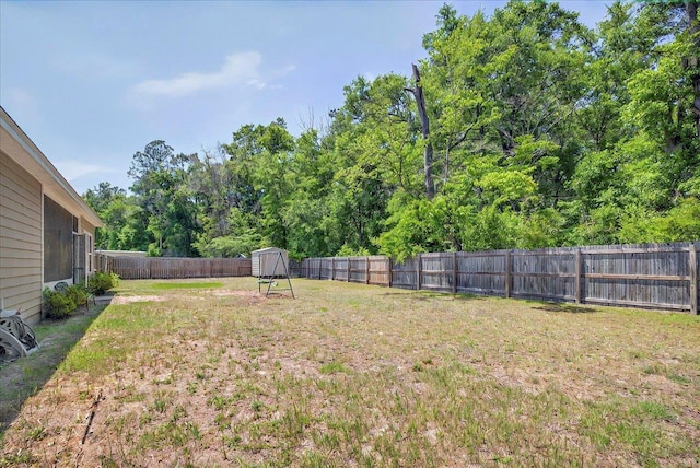 view of yard with a fenced backyard