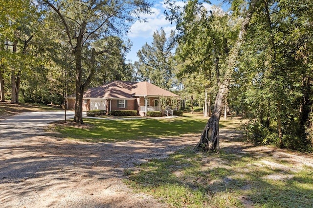 ranch-style home with a front yard and a porch