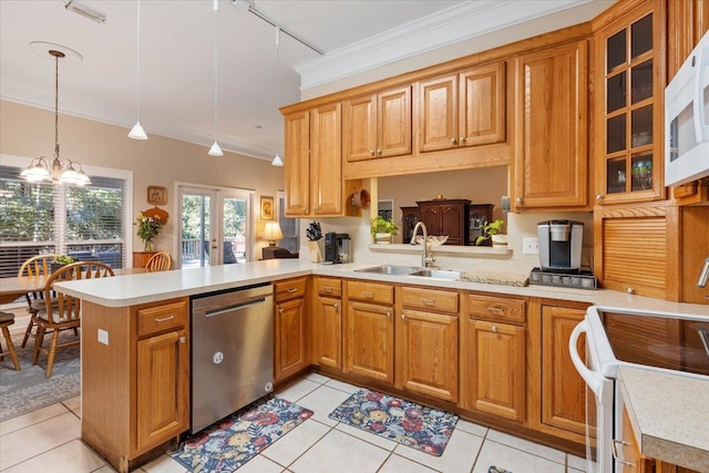 kitchen with kitchen peninsula, stove, light tile patterned floors, rail lighting, and stainless steel dishwasher