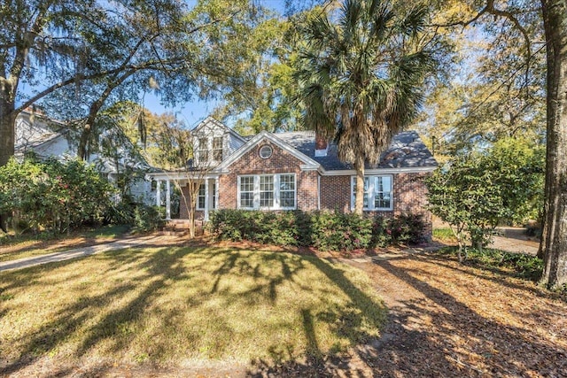 view of front of home with a front yard