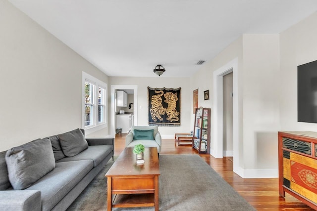 living room with hardwood / wood-style flooring