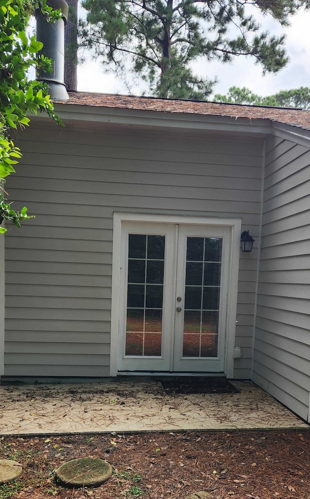 property entrance featuring french doors