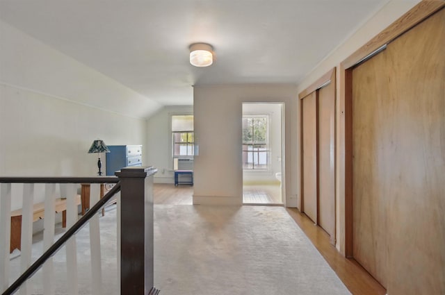 1118 W Green St, Perry, FL 32347 - hallway with light wood-style floors and vaulted ceiling