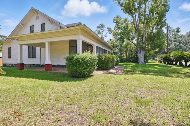 1118 W Green St, Perry, FL 32347 - view of side of property with a yard