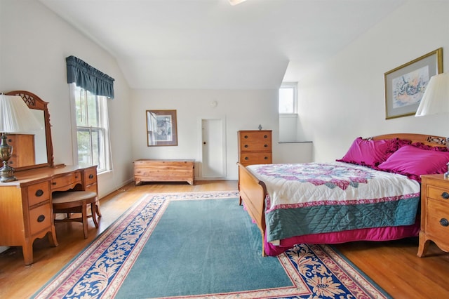 1118 W Green St, Perry, FL 32347 - bedroom with light wood-style flooring and lofted ceiling