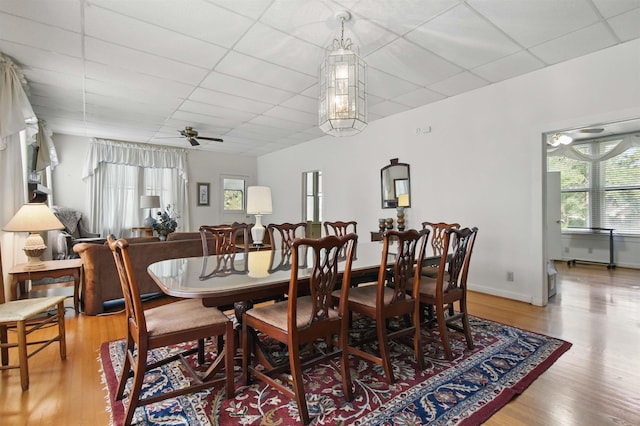 1118 W Green St, Perry, FL 32347 - dining space featuring a drop ceiling, light wood finished floors, a ceiling fan, and baseboards