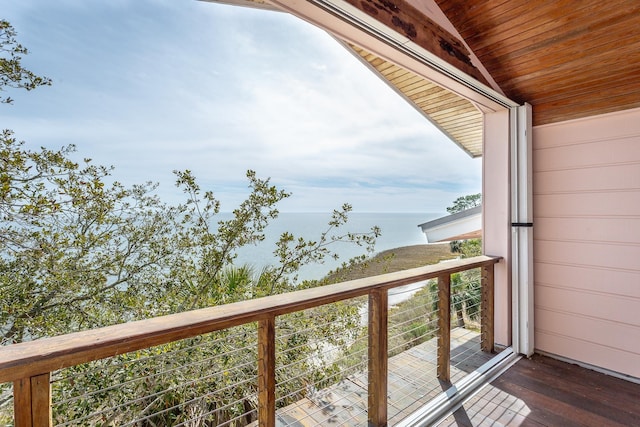 balcony featuring a water view