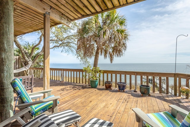 wooden terrace with a water view