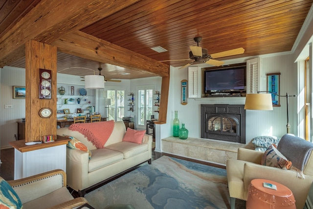 living room with wood-type flooring, a large fireplace, wooden ceiling, and ceiling fan