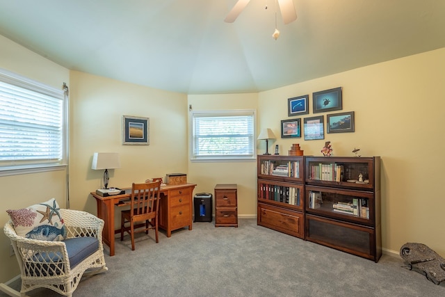 office space featuring carpet, lofted ceiling, and ceiling fan