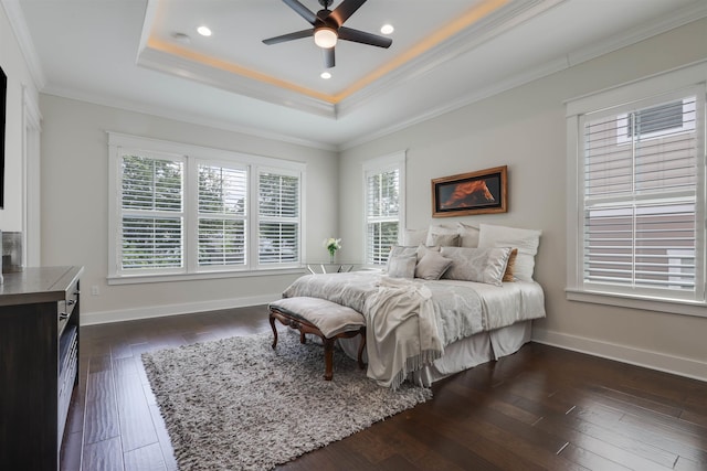 834 Piney Village Loop, Tallahassee, FL 32311 - bedroom featuring ornamental molding, dark wood-type flooring, a tray ceiling, recessed lighting, and baseboards