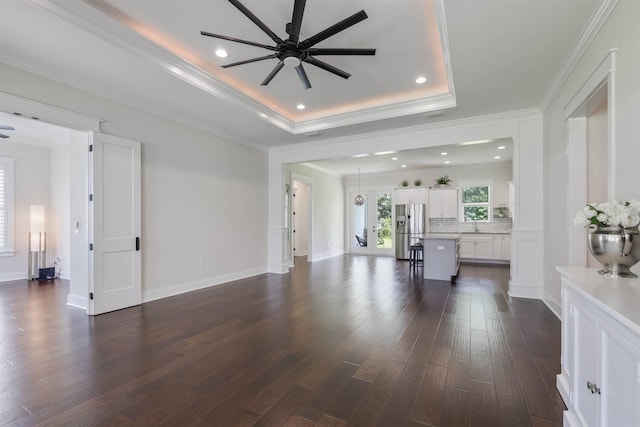 834 Piney Village Loop, Tallahassee, FL 32311 - living area featuring ceiling fan, dark wood finished floors, recessed lighting, a tray ceiling, and crown molding
