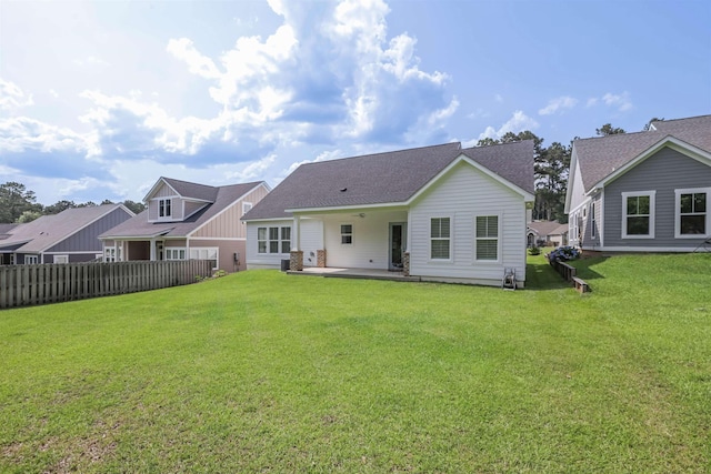 834 Piney Village Loop, Tallahassee, FL 32311 - rear view of property featuring a patio and roof with shingles