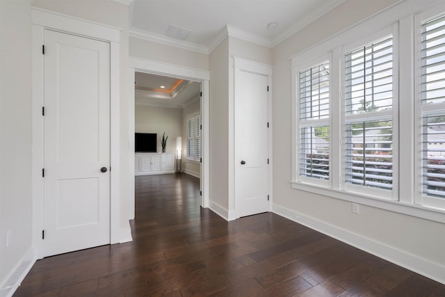 834 Piney Village Loop, Tallahassee, FL 32311 - empty room with ornamental molding, dark wood-style floors, and baseboards