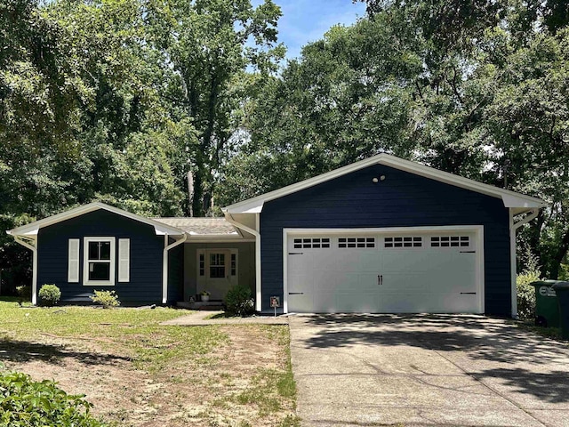 1937 Raymond Tucker Rd, Tallahassee, FL 32311 - ranch-style home with concrete driveway and an attached garage