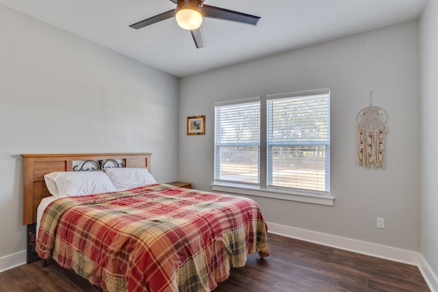 bedroom featuring dark wood-type flooring and ceiling fan