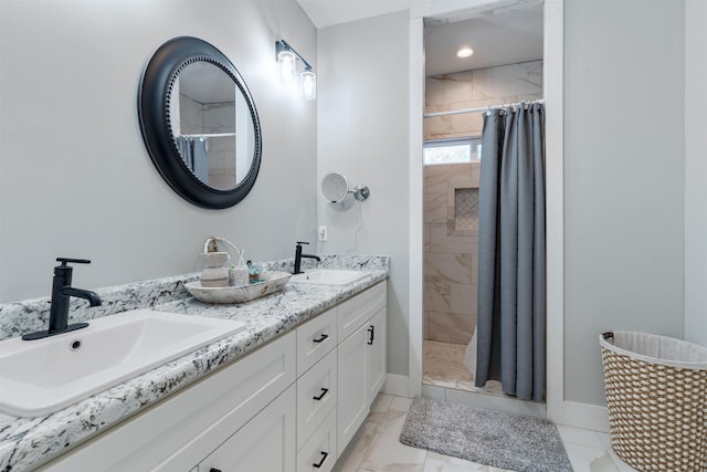 bathroom featuring a shower with curtain and vanity