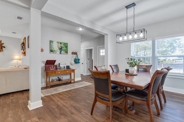 dining room featuring dark hardwood / wood-style flooring